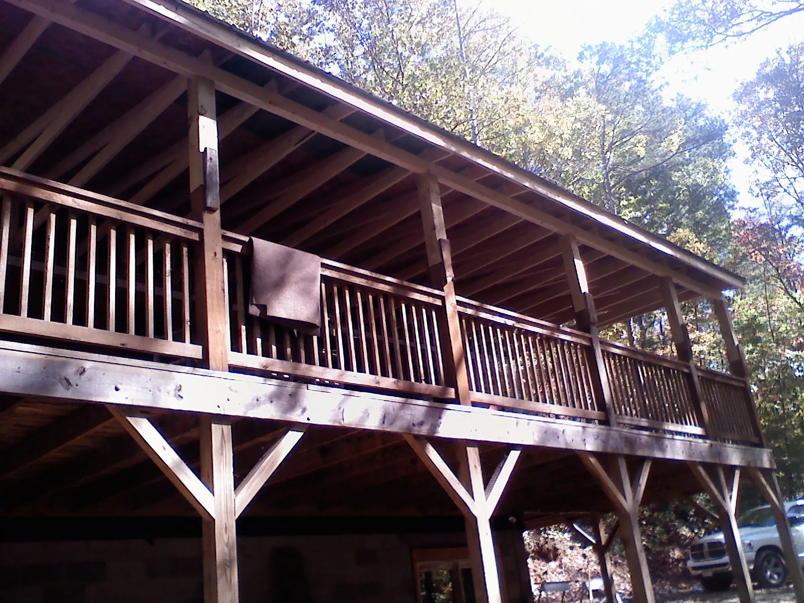 Timber framing under a new elevated porch and deck — Roof Leak Repair in Twin Lake by Roofing Brothers